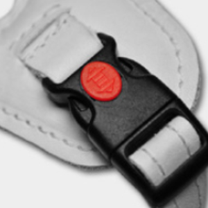 Fixlock with safety button strap fastener